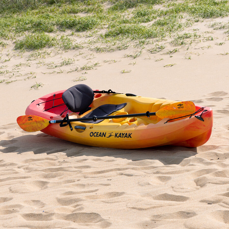 Single sit-on-top kayak on the sand